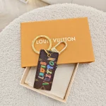 Louis Vuitton,  Louis Vuitton x NBA Letters Tab Key Holder & Bag Charm, , Brown, Very Very  Good - Image 2