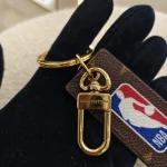 Louis Vuitton,  Louis Vuitton x NBA Letters Tab Key Holder & Bag Charm, , Brown, Very Very  Good - Image 4