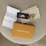 Louis Vuitton,  Louis Vuitton x NBA Letters Tab Key Holder & Bag Charm, , Brown, Very Very  Good - Image 9