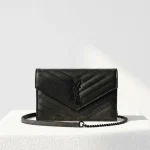 YSL, WOC,  7.5", Black, Very Very  Good